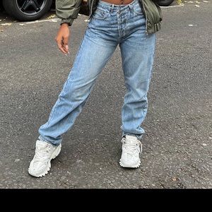 FashionNova crossover jeans